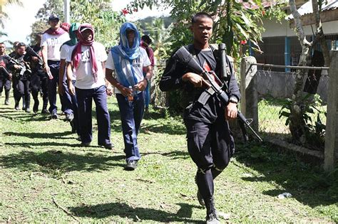 NPA attacks soldiers conducting survey in Davao del Norte town .